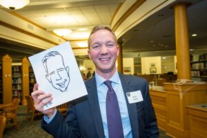 Milwaukee-Public-Library-Foundation-Ben-Franklin-Awards-Attendee-with-caricature