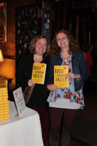 Milwaukee-Public-Library-Foundation-Literary-Luncheon-Attendees-with-Books